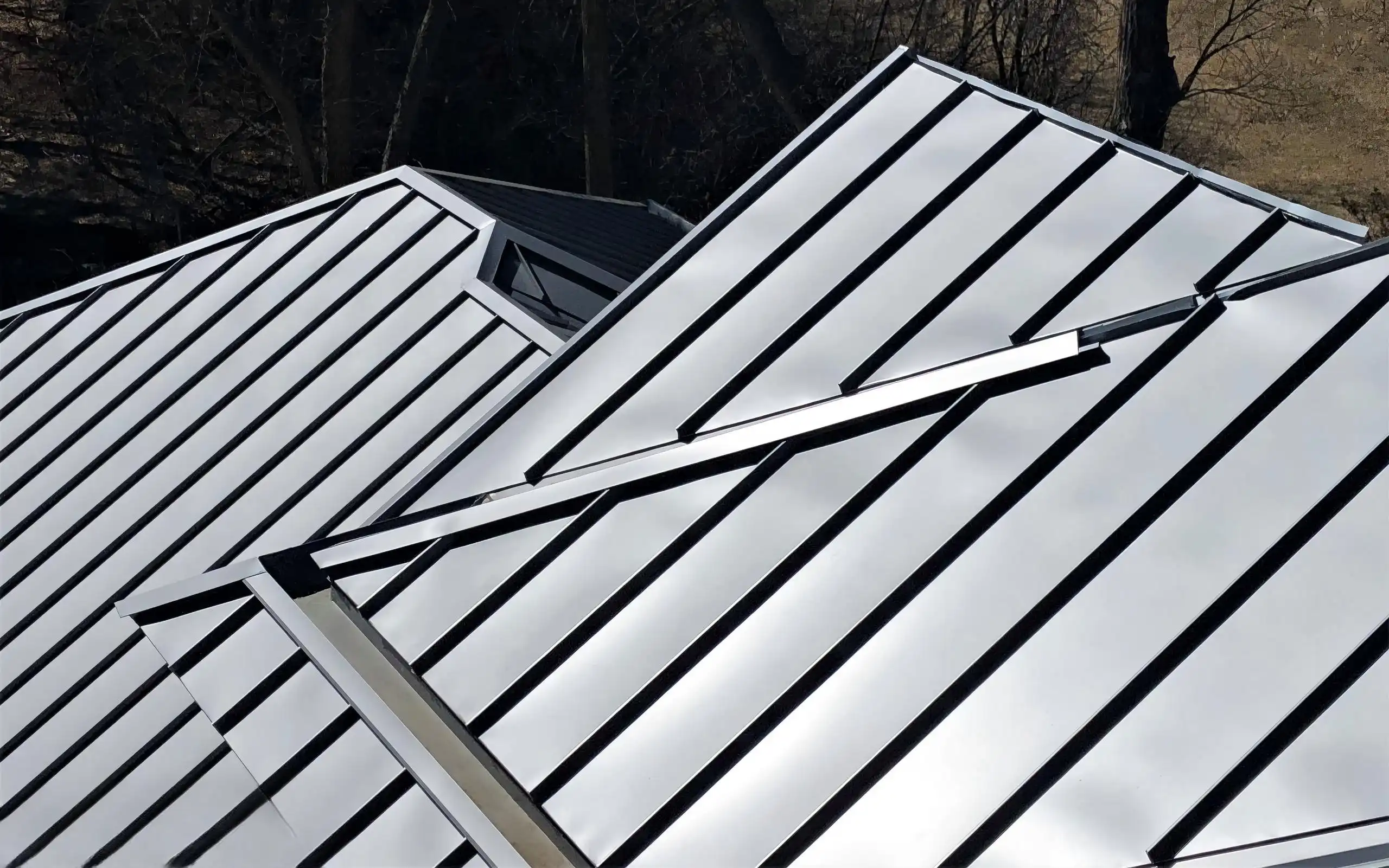 Aluminum standing seam roofing panels