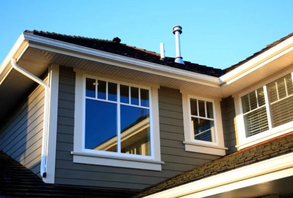 Vertical standing seam metal cladding Vertical standing seam metal cladding