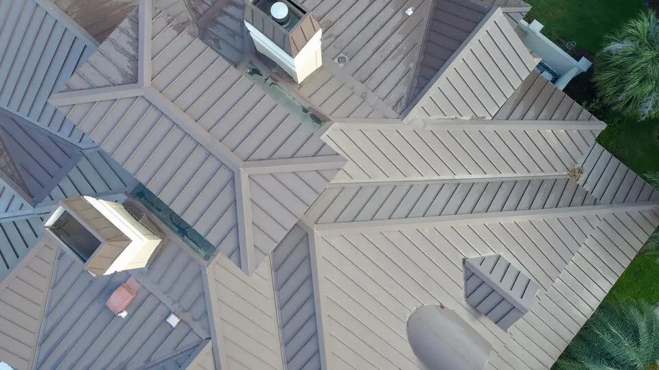 Metal standing seam roofing panels
