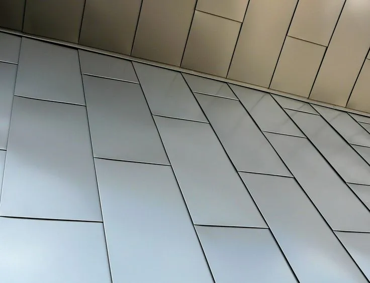 Flat lock seam metal wall panels