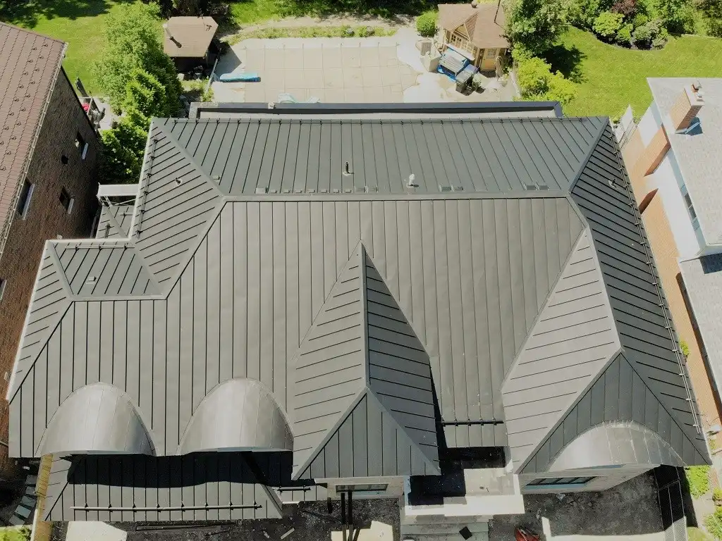 Striated standing seam roof panels