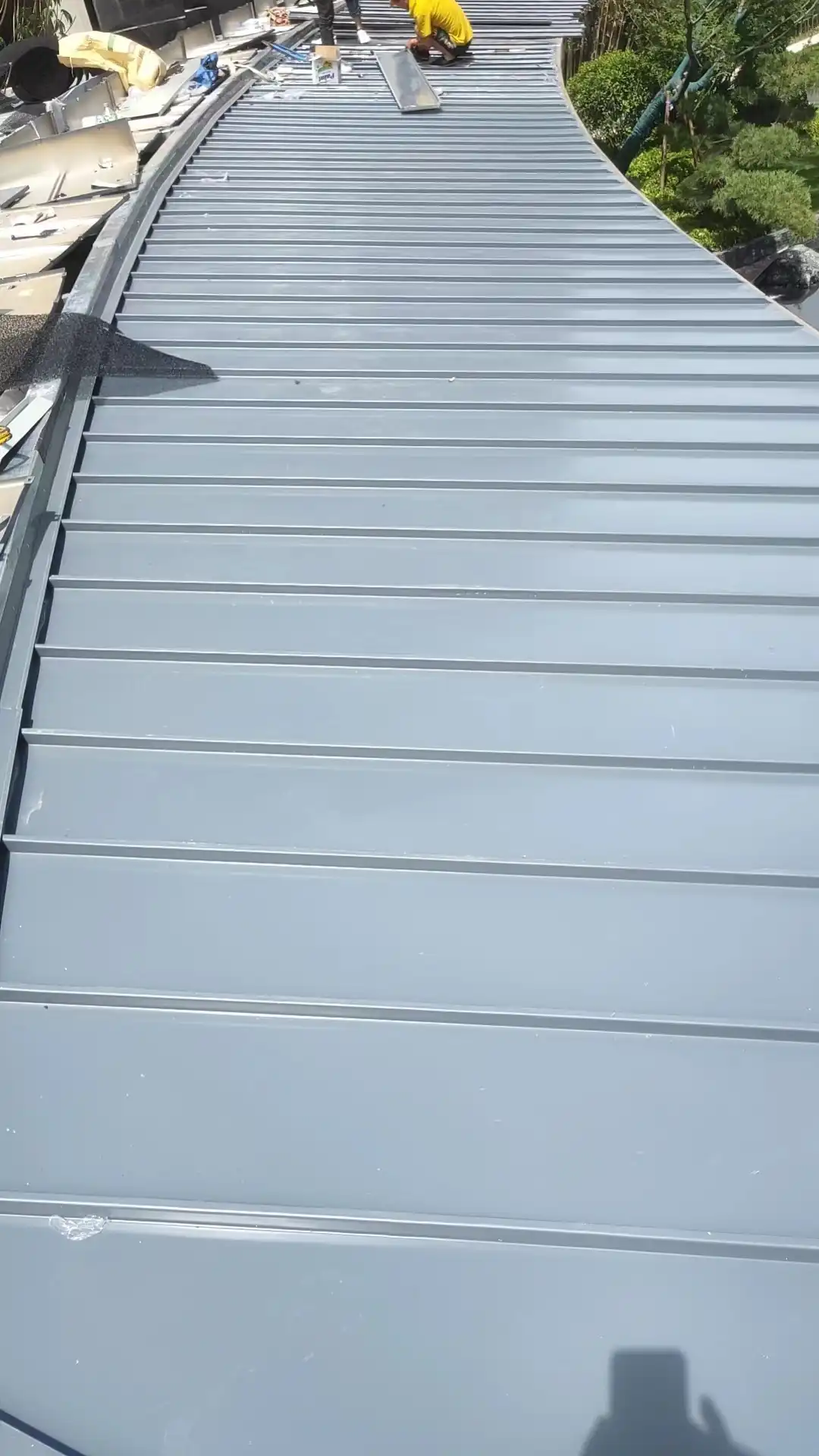 Structural metal panel roofing systems