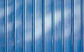 کاربردهای پنل‌های آلومینیومی موج‌دار در معماری پایدار